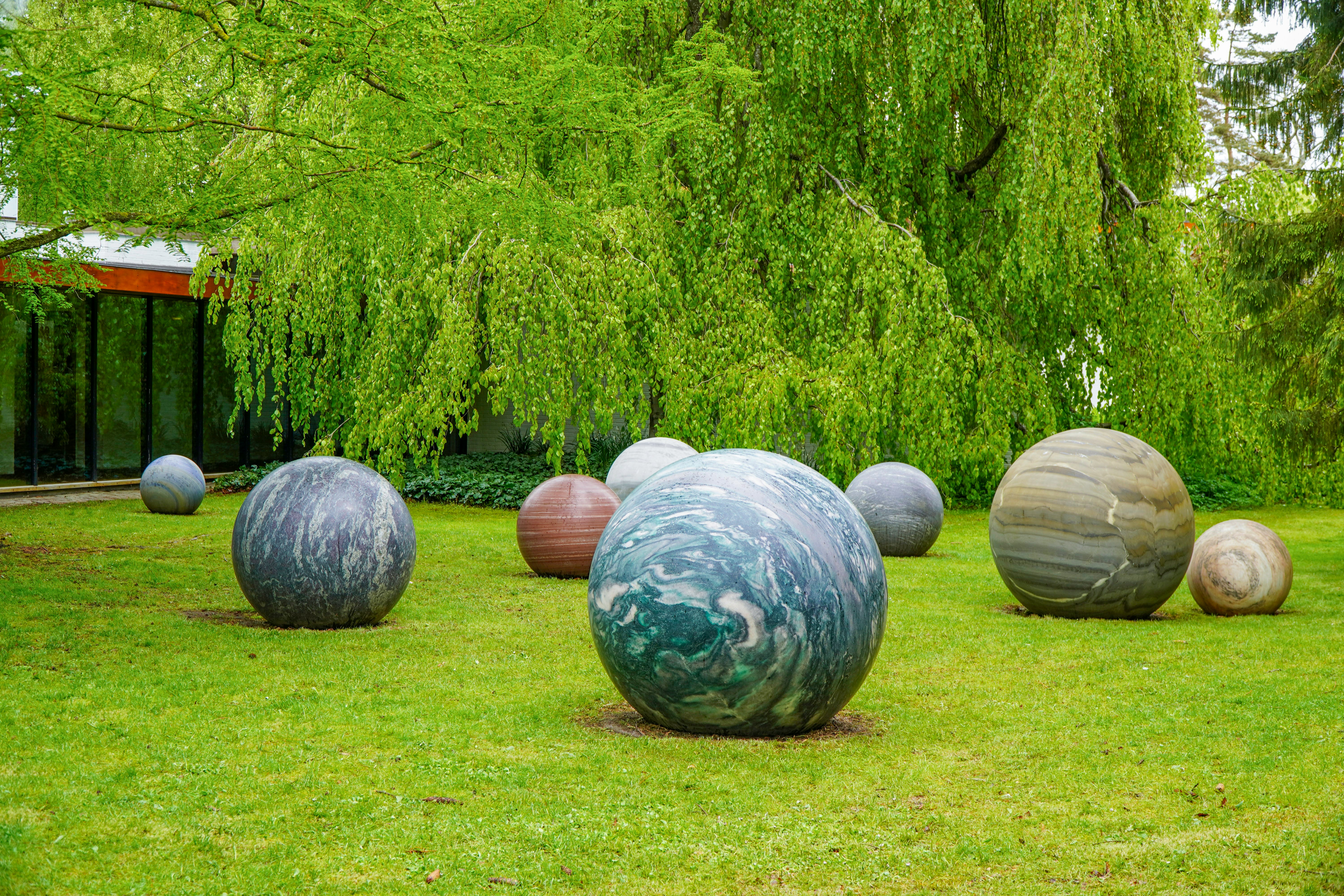 Planets laying on the ground in a park